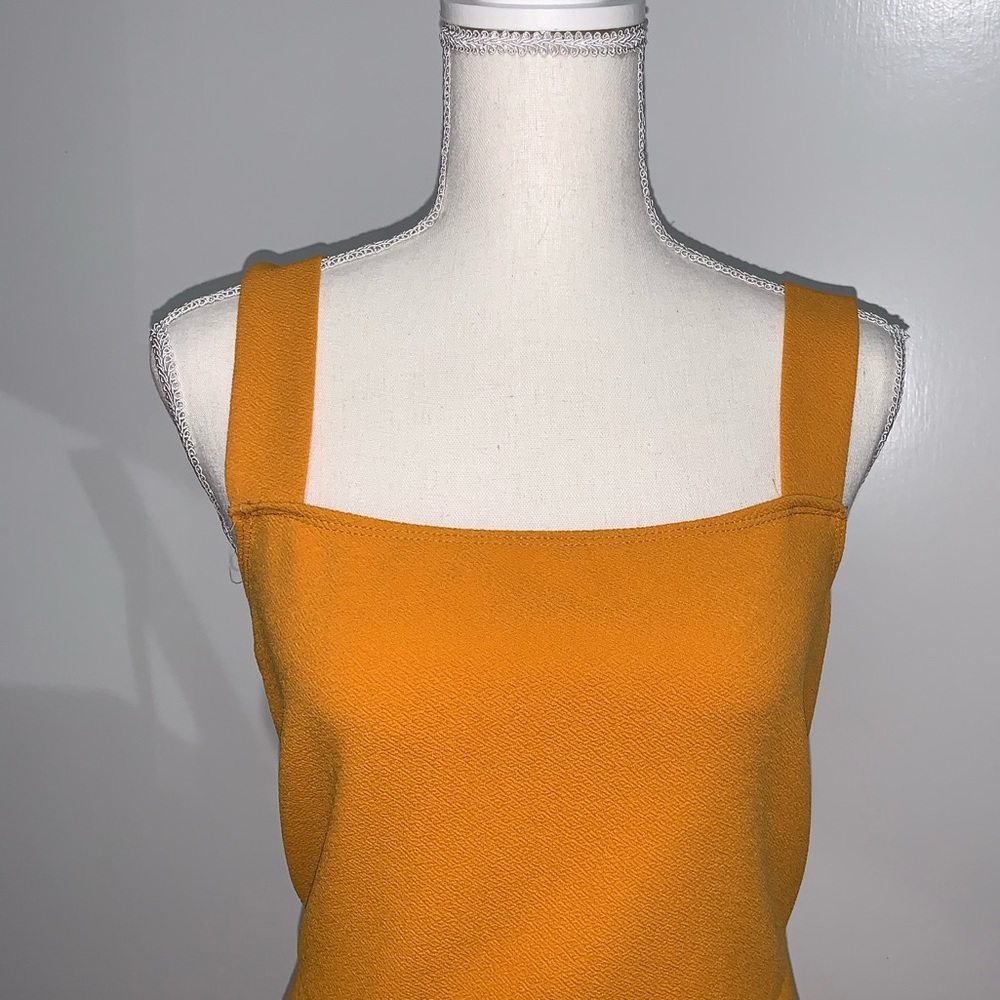 Knee length dress with high slit mustard color